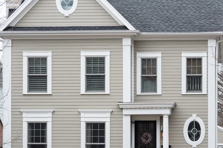 Colonial home with new lap siding and crisp white trim